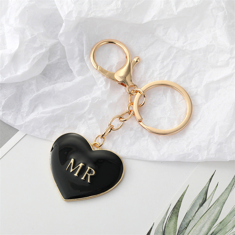 Wholesale Alloy Black and White Peach Heart Drip Oil Letter MrMrs Keychains